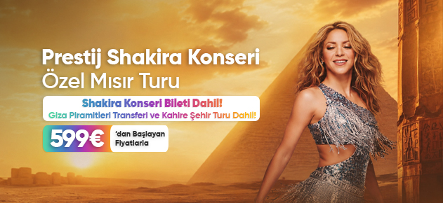Arka planda Giza Piramitleri ve gün batımı manzarası önünde Shakira görseli bulunan, 